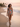Bandera one-piece swimsuit at the water's edge at dawn — House of Yas editorial