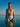 New Blue high-waisted bikini emerging from still turquoise water at golden hour — House of Yas editorial