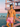 Pink men's swim trunks by a pastel pink lifeguard tower on Miami Beach — House of Yas editorial
