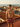 Red Tiles men's swim trunks on a terracotta Havana rooftop at golden hour — House of Yas editorial