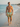 Varadero men's swim trunks walking the shoreline at golden hour — House of Yas editorial