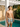 White Tiles men's swim trunks under a pergola beside a Havana estate pool — House of Yas editorial
