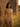 Tierra one-piece swimsuit before an earthen wall in the Cuban countryside at sunset — House of Yas editorial