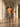 Casablanca men's swim trunks in a white colonial arcade at golden hour — House of Yas editorial