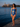 Virgen de Regla one-piece swimsuit at the edge of Havana bay at dusk — House of Yas editorial