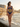 Patria y Libertad one-piece swimsuit on the Malecón seawall at dawn — House of Yas editorial
