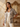 Caridad Unisex Button Shirt worn by model — House of Yas luxury campaign